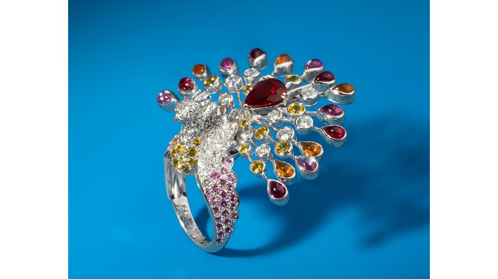 An 18-karat white gold peacock ring by Boucheron set with diamonds, rubies, and pink and yellow sapphires ($35,000 via Windsor Jewelers) A Boucheron peacock ring